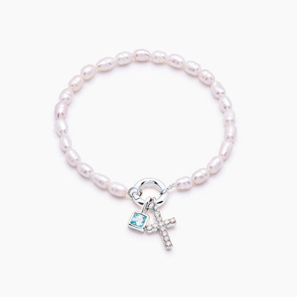 pearl-birthstone-cross-charm-bracelet — Silver / Mar-Aquamarine